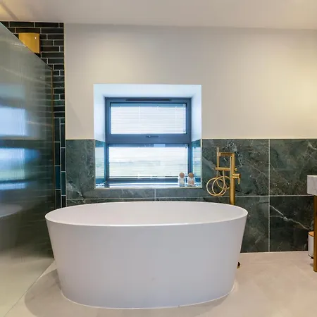 Semesterbostad Sandfield House *